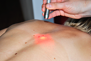 Massage mit Laser